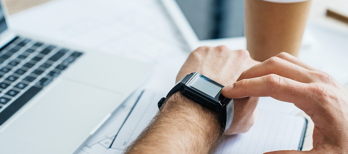 A hand with smartwatch