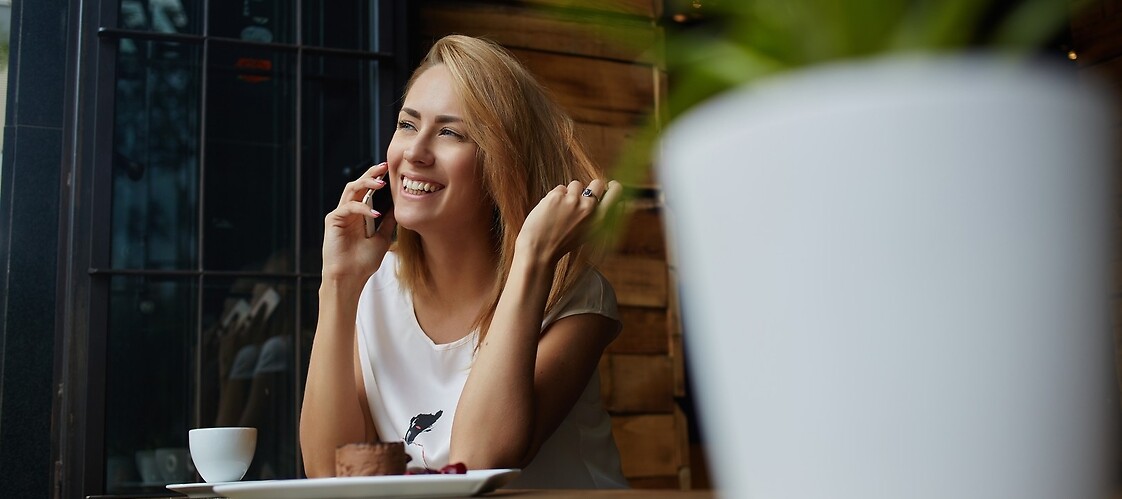 A woman calling with mobile phone