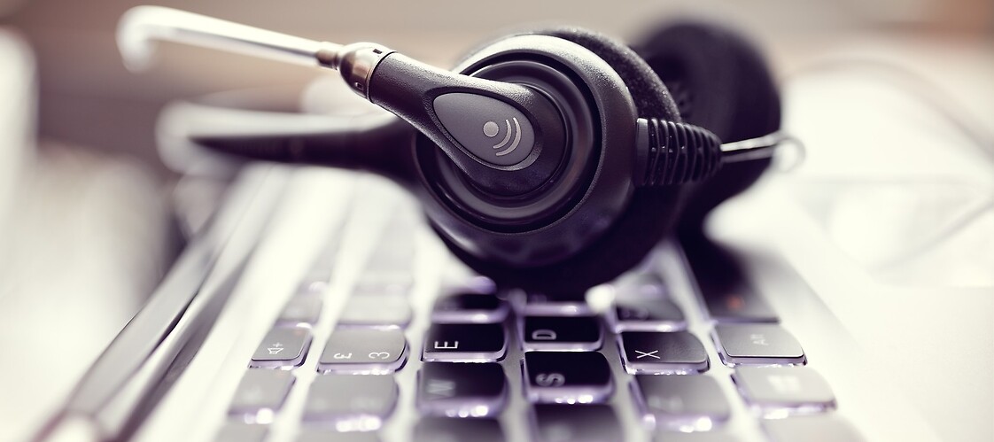 Headphones with microphone on the keyboard