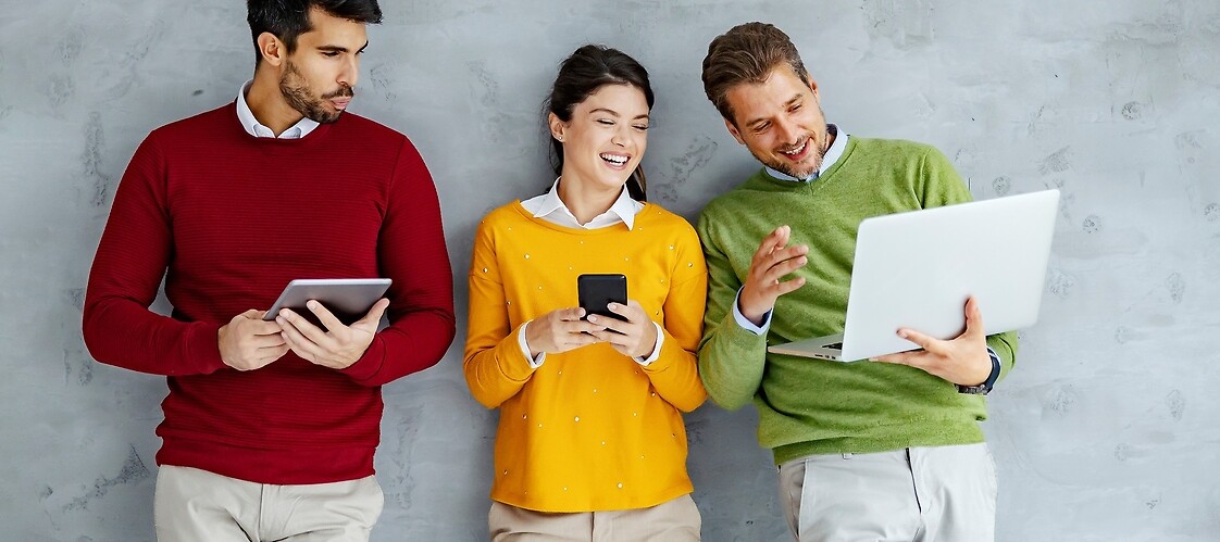 Two men and one woman wich mobile devices