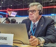 Man in grey jacket in the plenary chamber