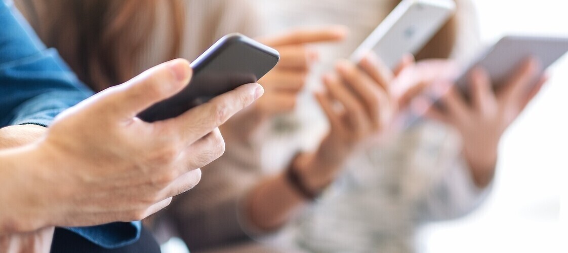 Hands holding smartphones