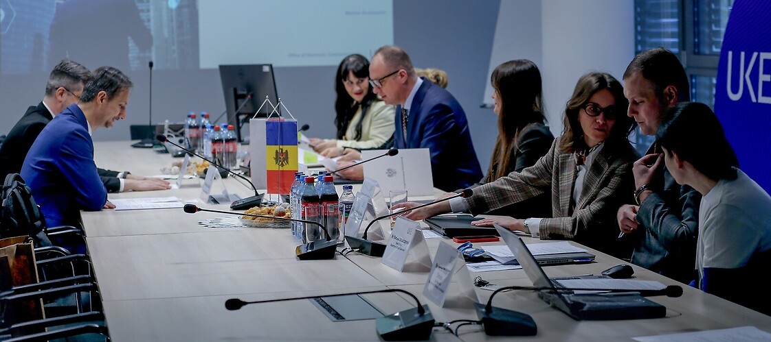 A group of people at a conference table