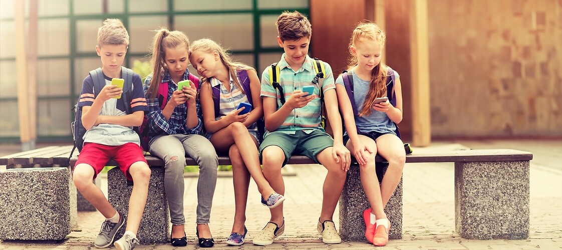 Young people using mobile phones