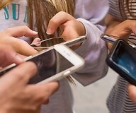 Hand of young people with smartphones