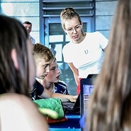 Teenagers from Nemenčinė in Lithuania coding with UKE